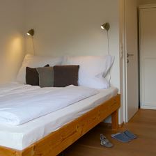 Ferienwohnung Rettenstein Schlafraum Bergblick im 