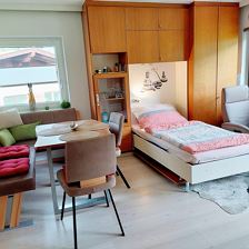 Wohnzimmer Ansicht mit Einzelbett