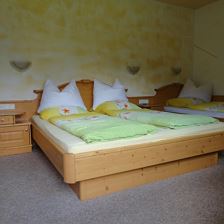 Double room with extra bed, shower, toilet, balcony