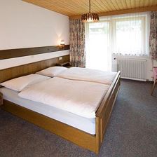Double room with extra bed, shower, toilet