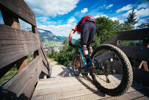 Kitzbühel Alps Hero Bike Marco Brandstätter rides across a Northshore on the trail in St.Johann in Tirol c Daniel Gollner