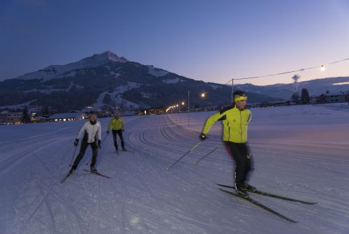 Cross-country skier at night - St. Johann in Tirol region
