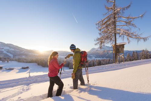 Winter hiker drinking tea - St. Johann in Tirol region